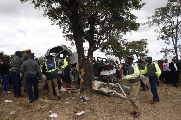 Police officers attend the scene