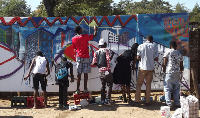 Street graffiti painters invade ghetto