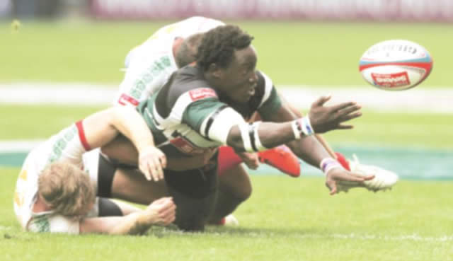 COMEBACK KID . . . Forward Tapiwa Tsomondo has been included in the Cheetahs squad after a 15-month absence. Here, he offloads the ball during the Pool G match between Zimbabwe and Mexico during Day One of the 2013 Hong Kong Sevens core qualifier