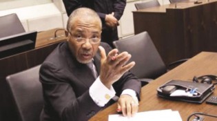 Former Liberian president Charles Taylor during his trial at the International Crimes Court which seems to target only African leaders for alleged crimes against humanity