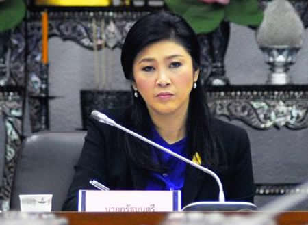 Thai PM sticks to poll plan