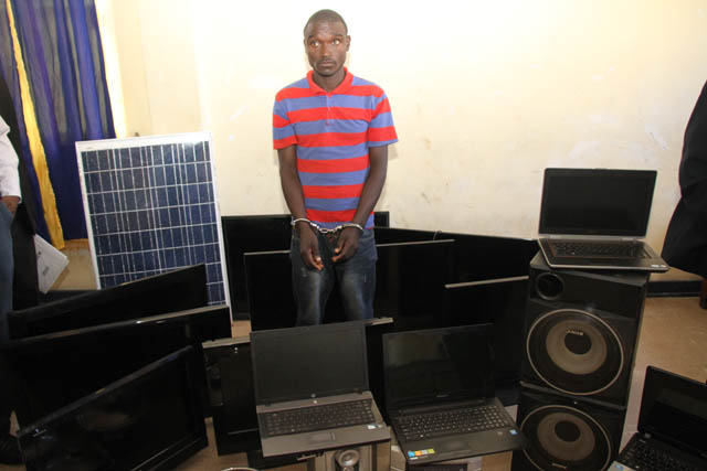 Housebreaking mastermind Emmanuel Murepa with some of the recovered property.
