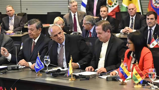 The photo shows (L-R) Uruguay’s Foreign Minister Rodolfo Nin Novoa, UNASUR’s Secretary General Ernesto Samper, Ecuador’s Foreign Minister Ricardo Patino and Venezuela’s Foreign Minister Delcy Rodriguez during a press conference in Quito on March 14, 2015. - AFP