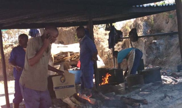Informal traders have constructed makeshift furnaces where cow hooves and heads are prepared before they are put on vending stalls for sale
