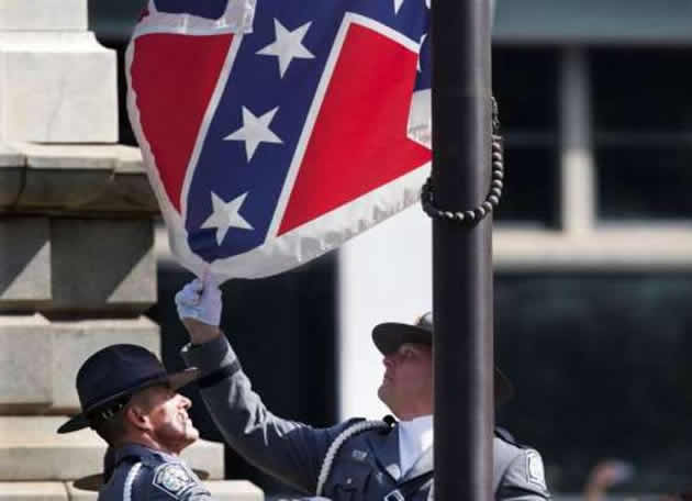 GOING DOWN . . . The Confederate flag and logo have long been seen by many Americans as too undeniably connected to slavery oppression to keep a respectable place in mainstream US culture