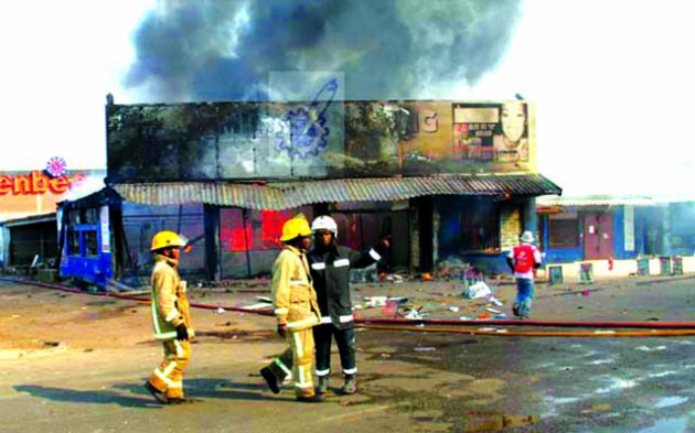 The city Fire Brigade allegedly arrived late to stop an inferno that razed this shop in central Harare