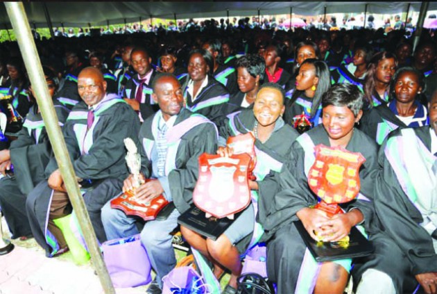 Best students at Morgan Zintec pose with their awards at the 39th graduation ceremony in Harare yesterday