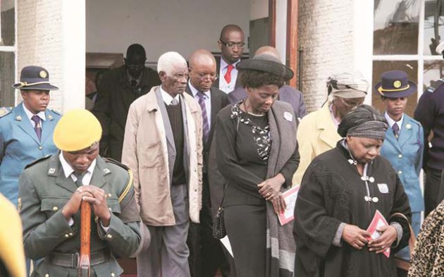 Secretary for Primary and Secondary Education Dr Sylvia Utete-Masango (centre) and other mourners after viewing national hero Dr Charles Utete’s body at Stodart Hall in Mbare, Harare, yesterday