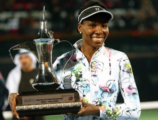 BACK IN THE GROOVE . . . Venus Williams poses with her trophy after winning the Dubai Duty Free Tennis Championships in Dubai on Saturday. — AFP