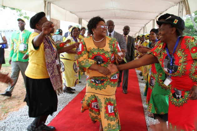 VP Joice Mujuru dancing upon her arrival conference venue