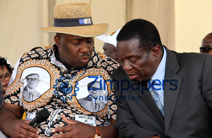 Sharing notes . . .Zanu-PF Political Commissar Cde Saviour Kasukuwere chats with Vice President Mnangagwa in Norton on Thursday. - Pic by Wilson Kakurira.  