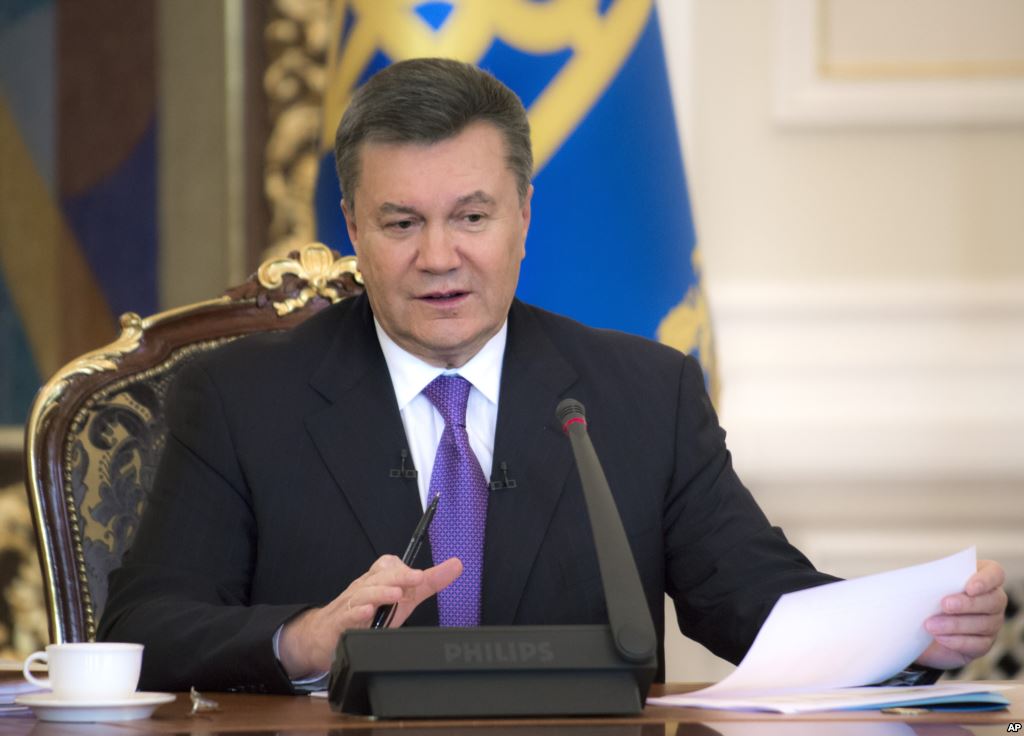 Yanukovich vows to fight on