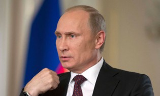 Vladimir Putin said Russia may approve military operation in Syria if Damascus is proven to have carried out chemical weapons attacks and UN authorises it- Ria Novosti/Reuters