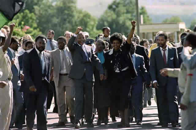 Flashback . . . A picture taken on February 11, 1990 shows anti-apartheid leader Nelson Mandela (centre left) and his wife Winnie raising victorious fists upon Mandela’s release from prison. — AFP
