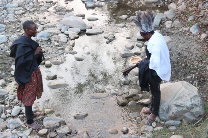 The community and Sekuru Sambiri at Mutsamvu Bridge where Mushango’s remains were recovered