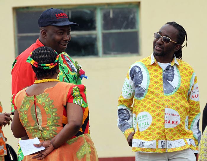 EARLIER: Cde Kasukuwere chats with Cde Patrick Zhuwawo (R) and Cde Mandi Chimene (with back to camera).