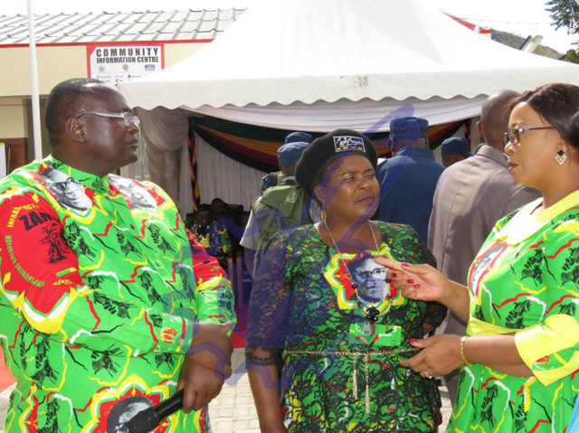 Cde Esau Mupfumi chats with Cde Mandi Chimene (center) and Mrs Mupfumi.