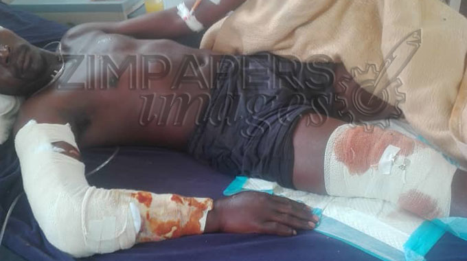 Croc attack survivor back in hospital