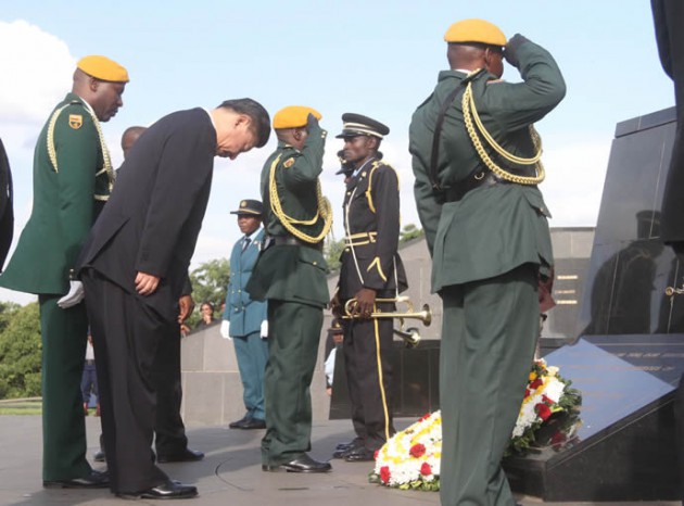 President Xi lays a wreath at the Tomb of the Unknown Soldier at the National Heroes Acre earlier today.