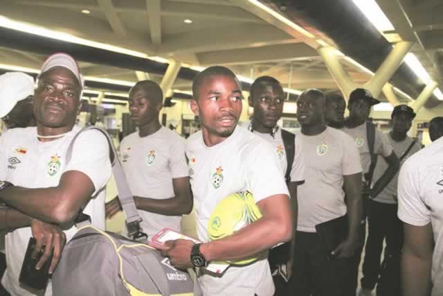 FOR OUR NATION . . . Young Warriors clear formalities at Harare International Airport yesterday before they left the capital for Morocco where they will play an international friendly tomorrow