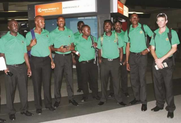 READY FOR BATTLE . . . Members of the Zimbabwe cricket team for the ICC World Twenty20 Cup pose for a group photograph before their departure for Bangladesh at Harare International Airport 