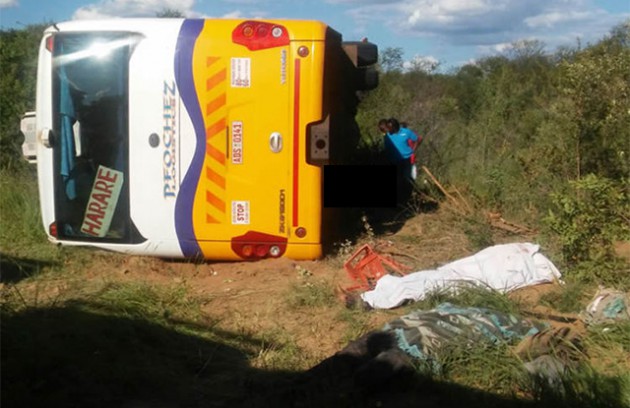A Pfochez Bus lies on its side off the road after an accident where 31 people died in March this year
