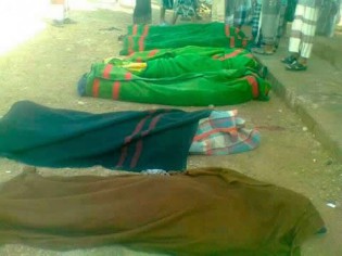 Dead soldiers are wrapped in blankets after gunmen opened fire at the military headquarters in Mayfaa, Yemen's southern province of Shabwa September 20, 2013, in this photo provided by the Adenalghad newspaper. REUTERS/Adenalghad 