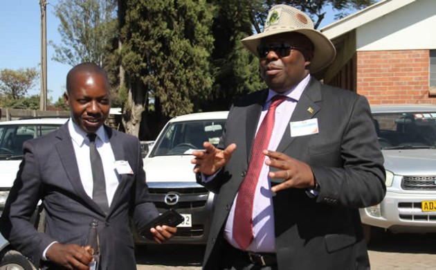 Zanu-PF political commissar Cde Saviour Kasukuwere (R) with Highfield West Zanu-PF candidate Cde Psycology Maziwisa
