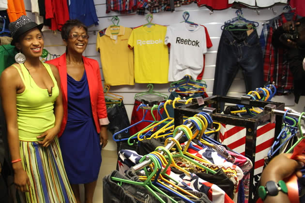 ALL SMILES . . . Beverly Sibanda (left) and Catherine Nyangoni of PHD Ministries soon after the official opening of her shop