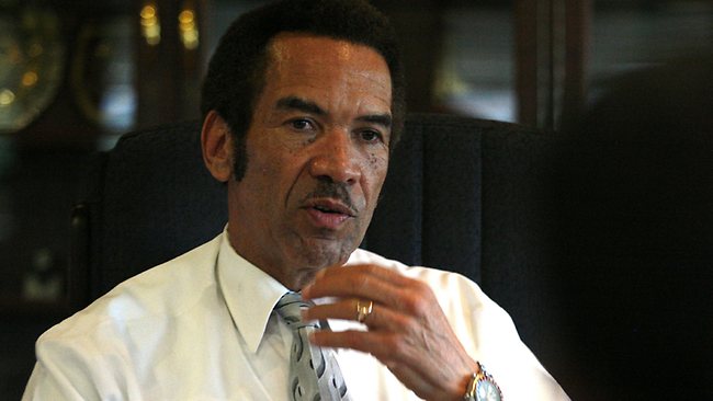 Khama climbs down