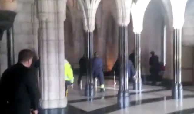 Horror: Footage shows the moment multiple gunshots ran out around the marble halls - too many to count - and the police were seen to advance on the shooters apparent position. – Daily Mail