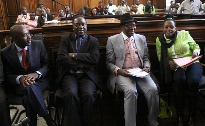Defence Minister Emmerson Mnangagwa flanked by ICT Minister Nelson Chamisa,Finance Minister Tendai Biti and MDC Secretary General Priscilla Misihairambwi at the nomination court in Harare.