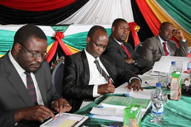 Information, Media and Broadcasting Services Minister Professor Jonathan Moyo (second left) is flanked by Secretary for Information, Media and Broadcasting Services Mr George Charamba (left), Deputy Minister Cde Supa Mandiwanzira and Zimpapers board chairman Dr Paul Chimedza, who is also Deputy Minister of Health and Child Care, at a workshop in Harare yesterday
