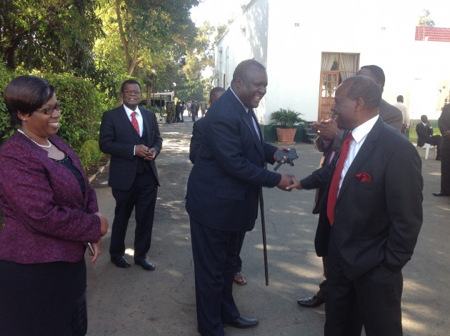 Public Service, Labour and Social Welfare Minister Nicholas Goche greets President of the Chief's Council Fortune Charumbira while Deputy Minister of Industry and Commerce Chiratidzo Mabuwa and NetOne managing Director Reward Kangai looks on (pic by Lloyd Gumbo)