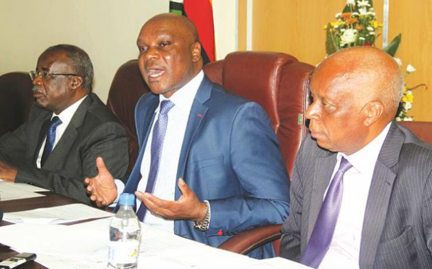 Mines and Mining Development Minister Walter Chidhakwa (centre), flanked by Permanent Secretary Professor Francis Gudyanga (left) and Principal Director Valentine Vera, addresses journalists at a Press conference in Harare yesterday. — (Picture by Tariro Kamangira)