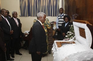 Defence Minister Sydney Sekeramayi leads Environment, Water and Climate Minister Saviour Kasukuwere, Local Government, Public Works and National Housing Minister Ignatius Chombo, Air Force of Zimbabwe Commander Air Marshal Perrance Shiri during the body viewing of Chief Mangwende in Harare yesterday