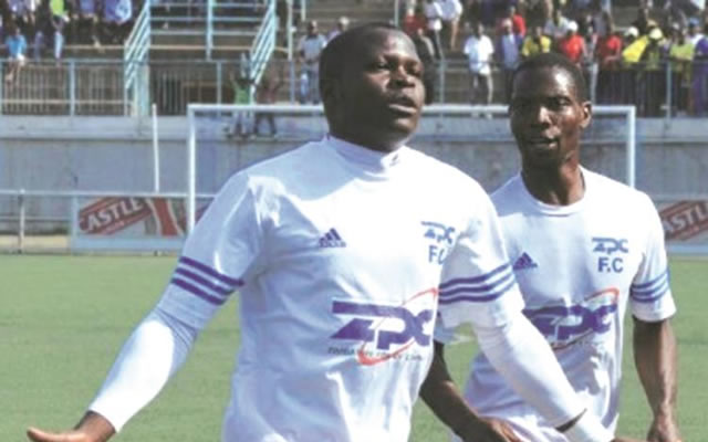 RUMBLE IN THE COLLIERY . . . ZPC Kariba forward Limited Chikafa tries to beat Hwange skipper Gerald Ndlovu for pace in their Castle Lager Premiership tie yesterday