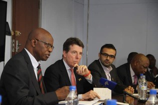Finance and Economic Development Minister Patrick Chinamasa (left) addresses journalists as Atlas Mara chief executive Mr Bob Diamond (second left), Mr Ashish Thakkar  and Finance and Economic Development director Mr Andrew Bvumbe (right) follow proceedings during a Press conference yesterday