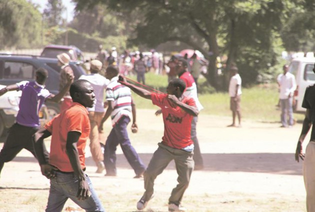 Rowdy youths and kombi crews patrol the streets of Chitungwiza, using catapults against the police. —(Pictures by Innocent Makawa and Lovemore Meya)