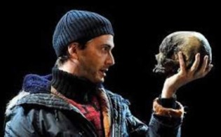 An actor portrays Hamlet as a protagonist in the play of the same name