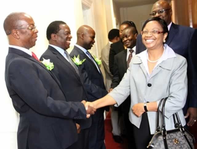 Chief Justice Godfrey Chidyausiku, Justice, Legal and Parliamentary Affairs Minister Emmerson Mnangagwa and prosecutor-general Mr Johannes Tomana congratulate Ms Priscilla Mudzonga, chief magistrate Mr Mishrod Guvamombe and Law Society of Zimbabwe President Mr Lloyd Mhishi after the swearing in of Judiciary Service and Zimbabwe Human Rights commissioners at the Supreme Court in Harare yesterday. — (Picture by Munyaradzi Chamalimba)