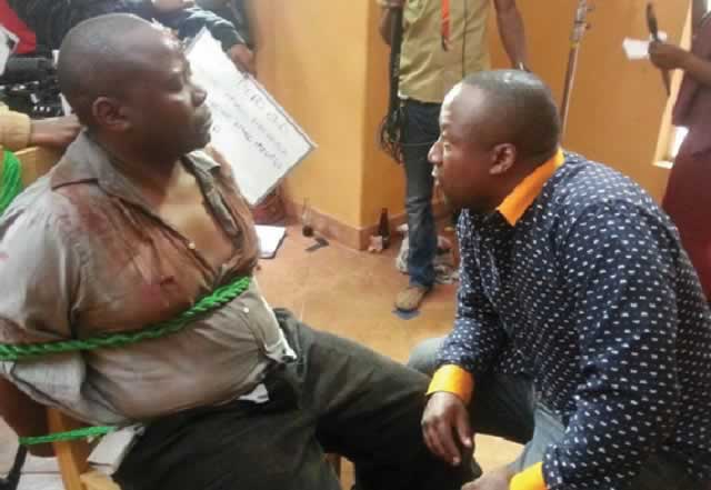 “Dead End” director Moses Matanda (right) shares notes with Conrad Mwanawashe (Pastor Joseph Mambo) on set for the new TV series