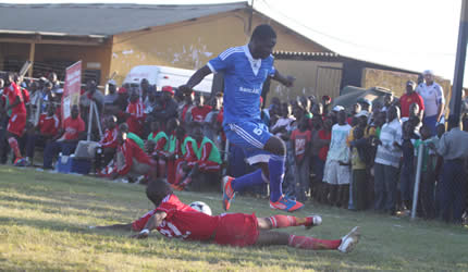 Dembare blame draw on rough turf
