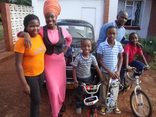 IN HAPPIER TIMES . . . Afro-jazz star Dudu Manhenga (second from left) with her husband and kids