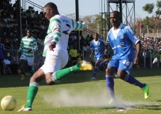 TAKING NO PRISONERS . . . FC Platinum’s Daniel Vheremu (right) clears the ball under close attention from Simba Sithole at Mandava yesterday