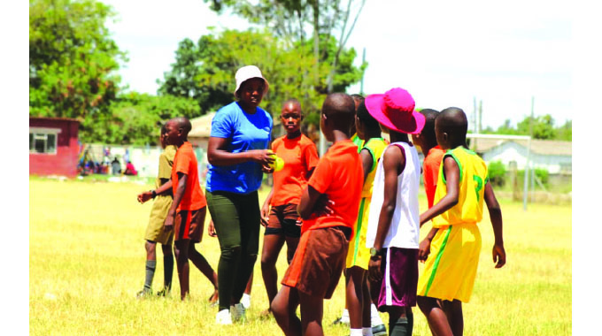 Collins makes softball coaching history
