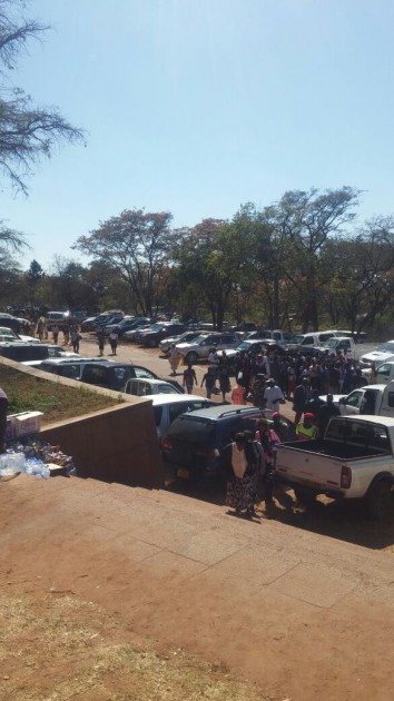 People arrive at the Heroes Acre.