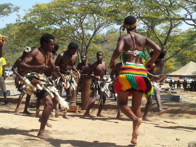 A dance group entertains the crowd attending Heroes Day celebrations