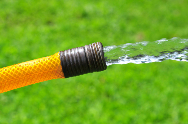 Man connects hosepipe, waters stepmother’s furniture