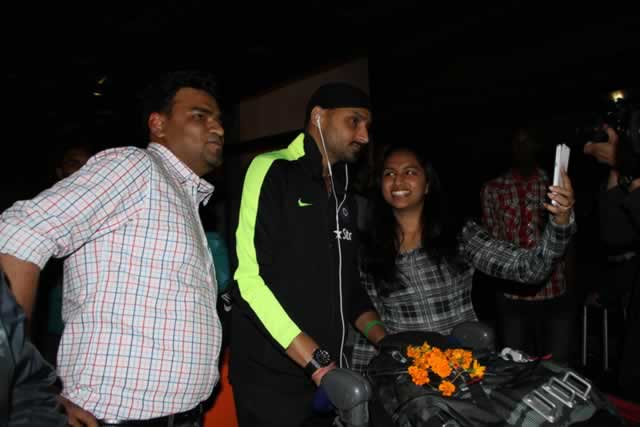 STAR ATTRACTION . . . Indian fans jostle for a selfie with veteran spinner Harbhajan Singh at Harare International Airport yesterday shortly after the arrival of the former world champions in the country